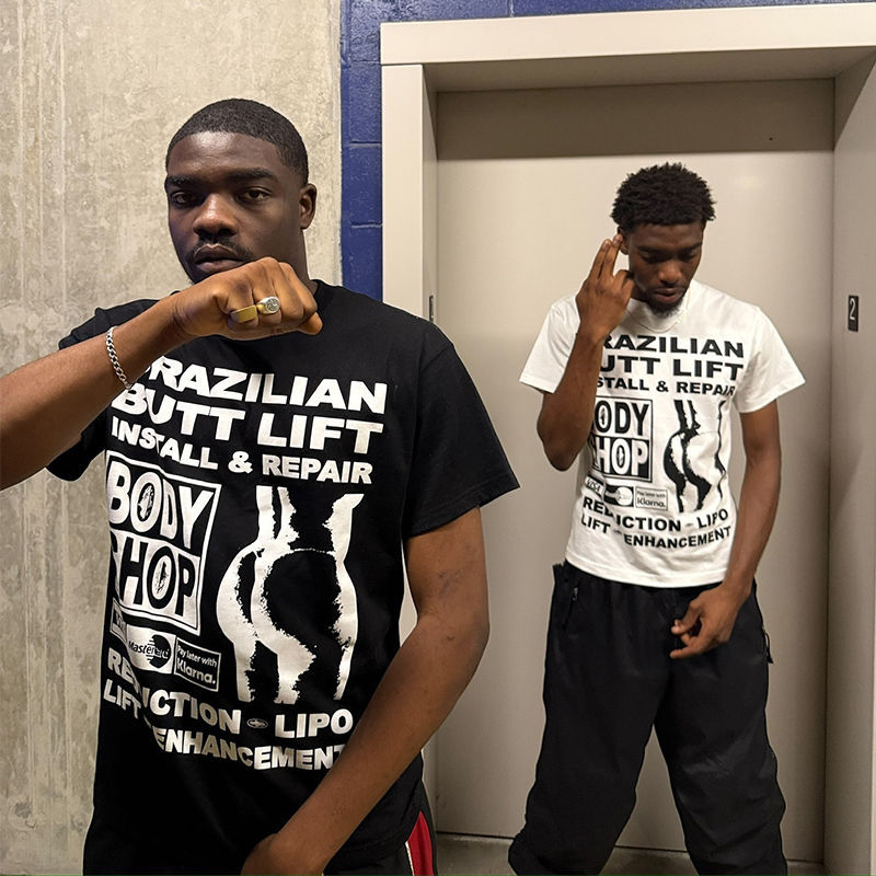 Corteiz Brazilian Butt Lift Install and Repair Tee Black Wearing Effect