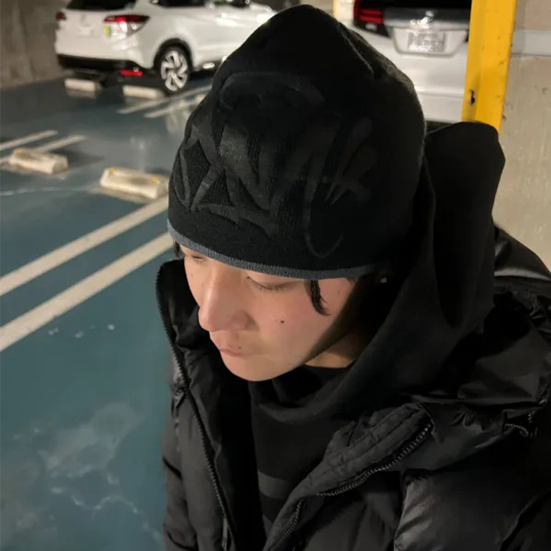 Syna World Debossed Beanie Black Wearing Effect