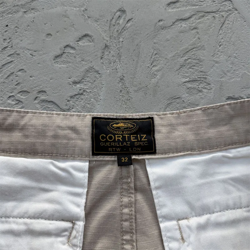 Corteiz Guerillaz cargo pants garment label detail