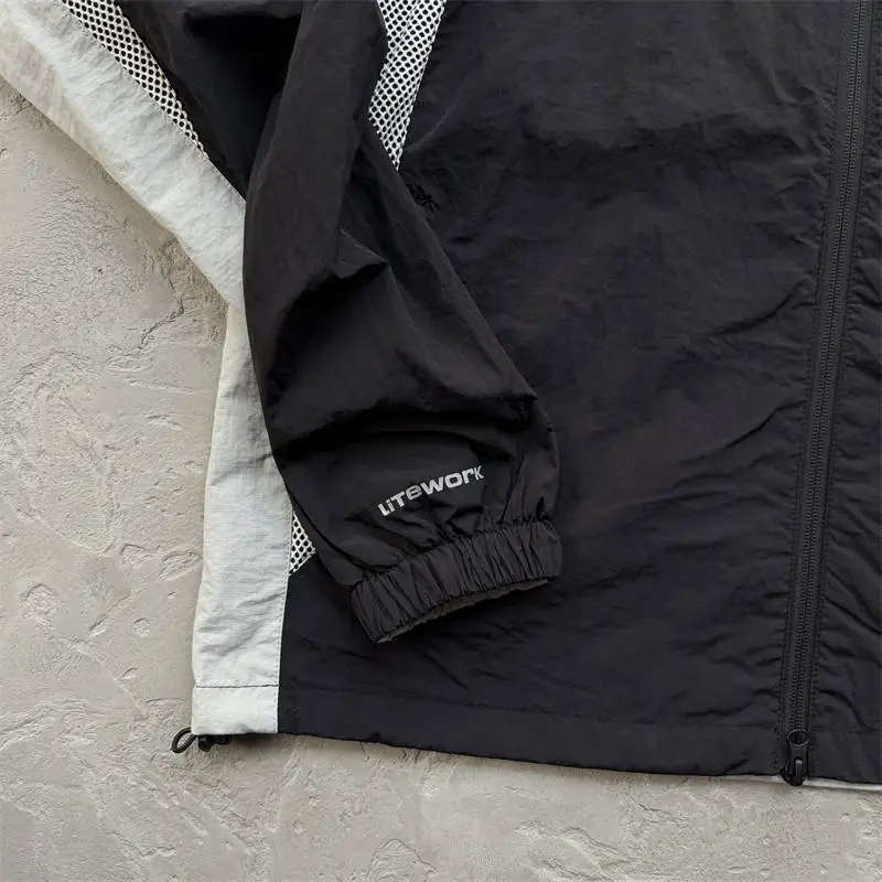 Corteiz Spring Jacket V2 sleeve cuff lower hem and front zip detail