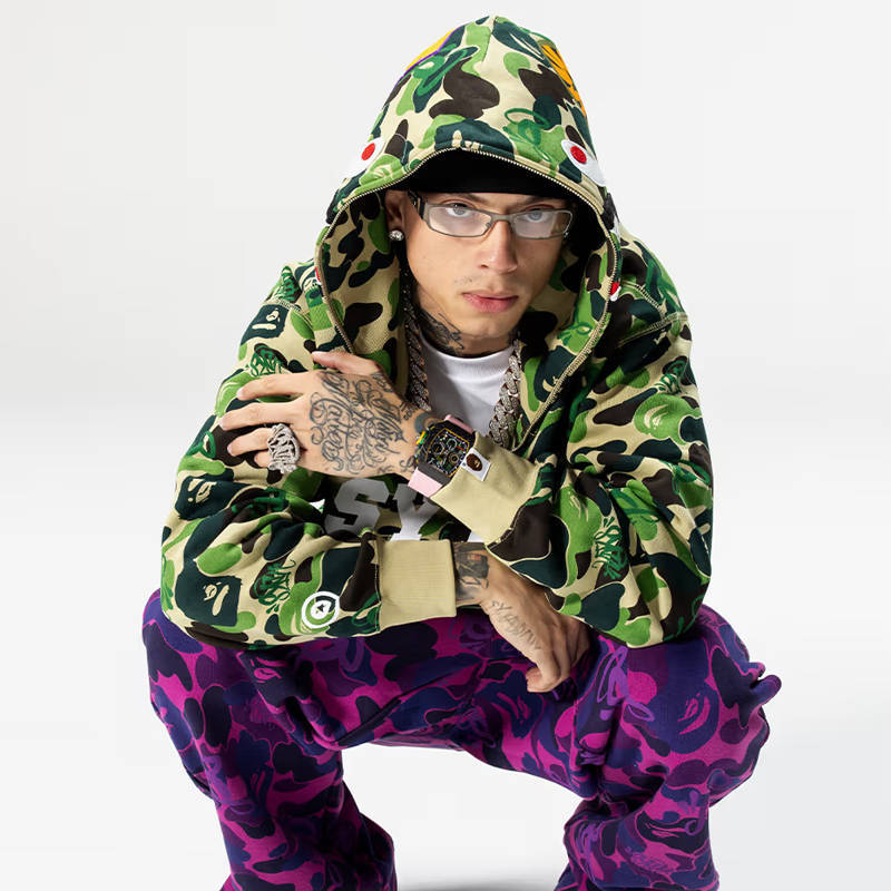 Syna World X BAPE Spotify by Central Cee Shark Full Zip Hoodie and Camo Relaxed Fit Sweatpants Green Wearing Effect