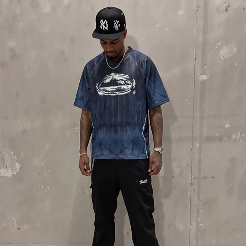 Blue Corteiz Jersey Football V-Neck Tee shown in a worn outfit