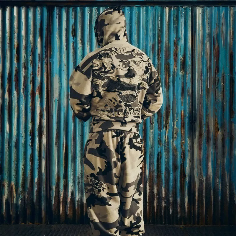 Corteiz Diplomatic grey camouflage tracksuit showing patterned sweatpants