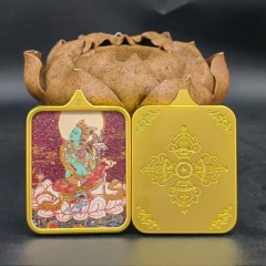 Cinnabar Tara statue (G)
