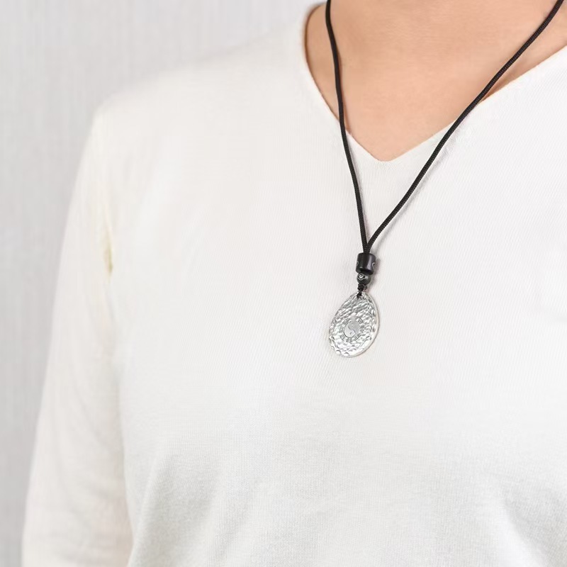 Teardrop-shaped Pendant with the Tai Chi and Bagua symbols