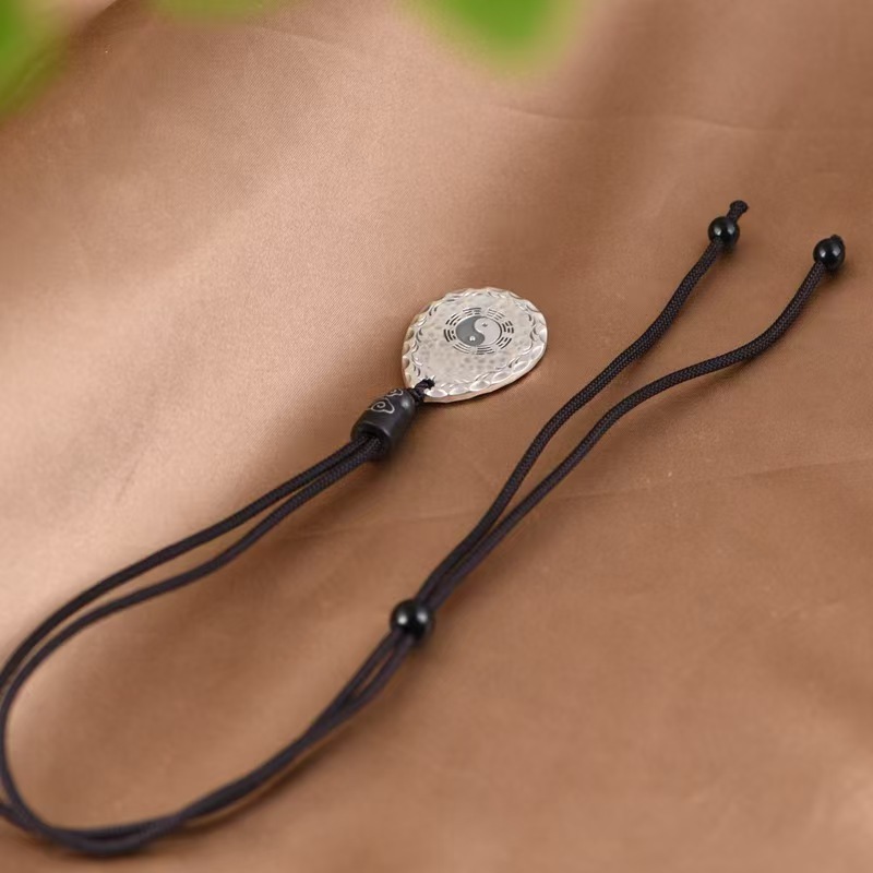 Teardrop-shaped Pendant with the Tai Chi and Bagua symbols