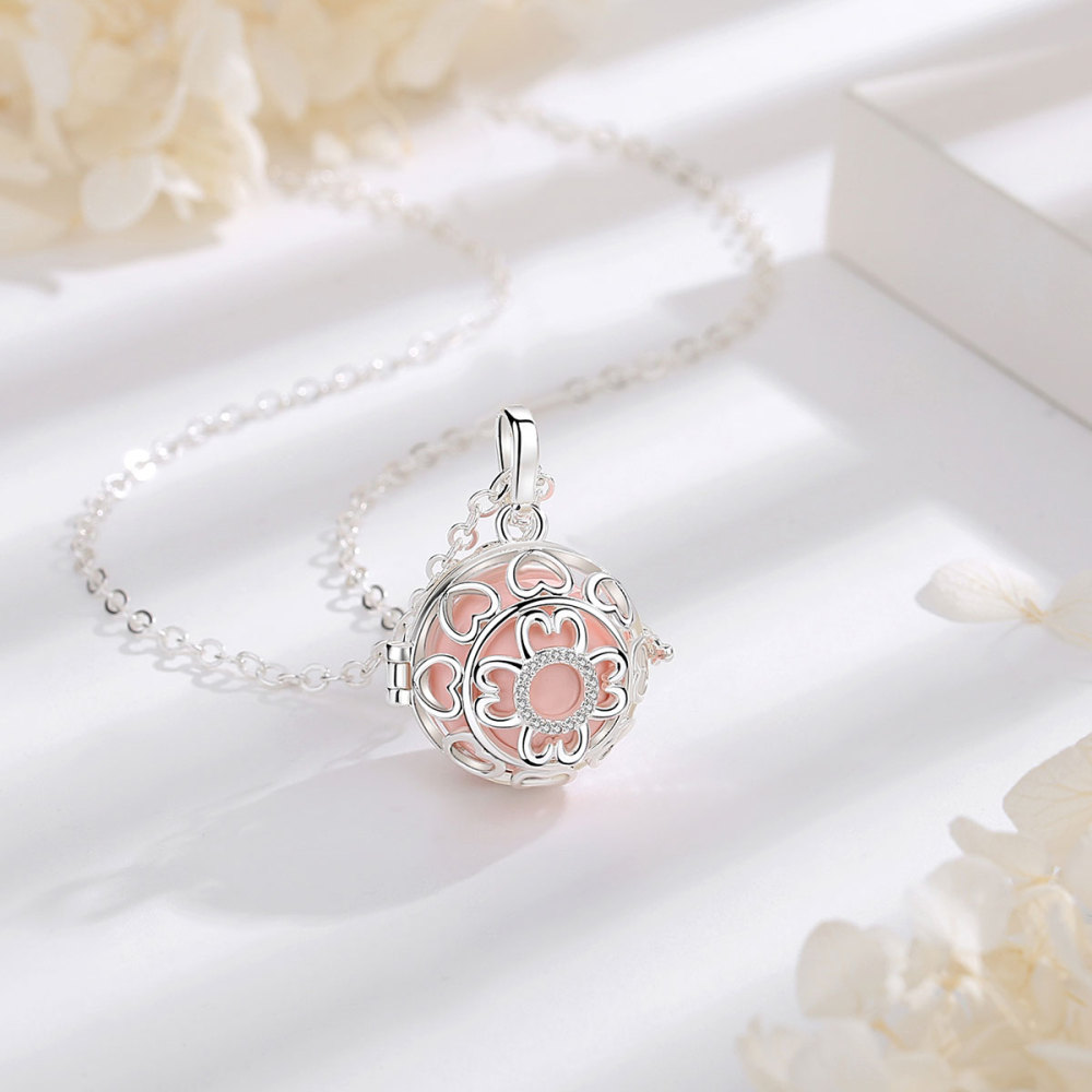 Silver-Plated Celtic Knot Heart Cage Pendant