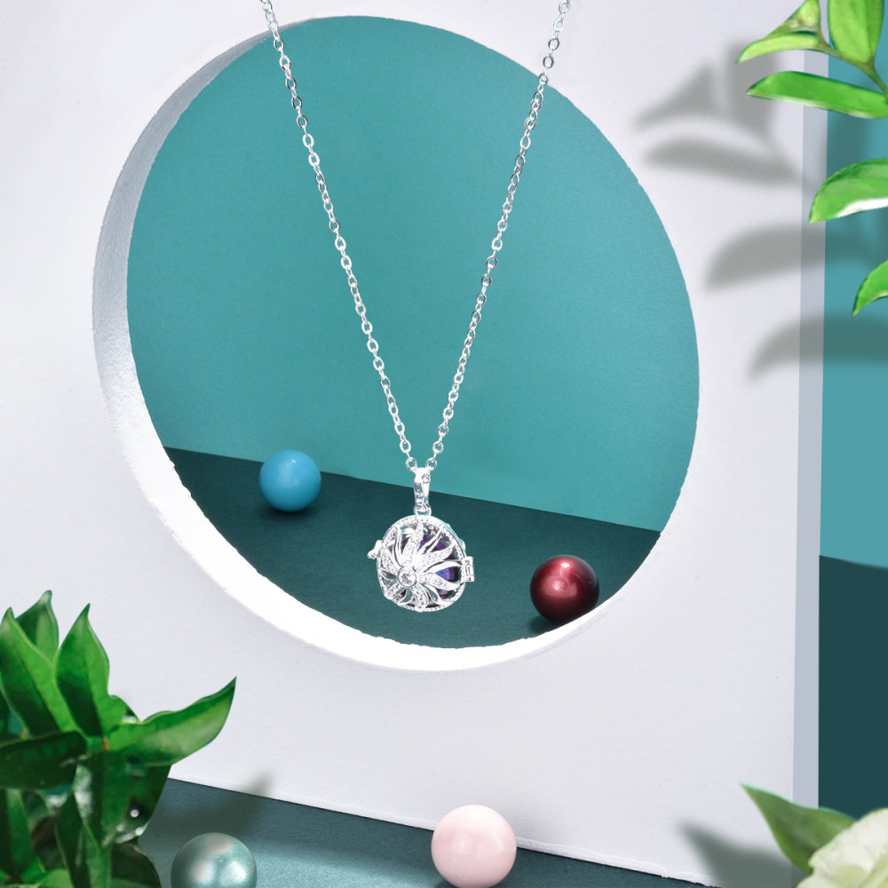 Cubic Zirconia Sun Chime Balls Cage Pendant