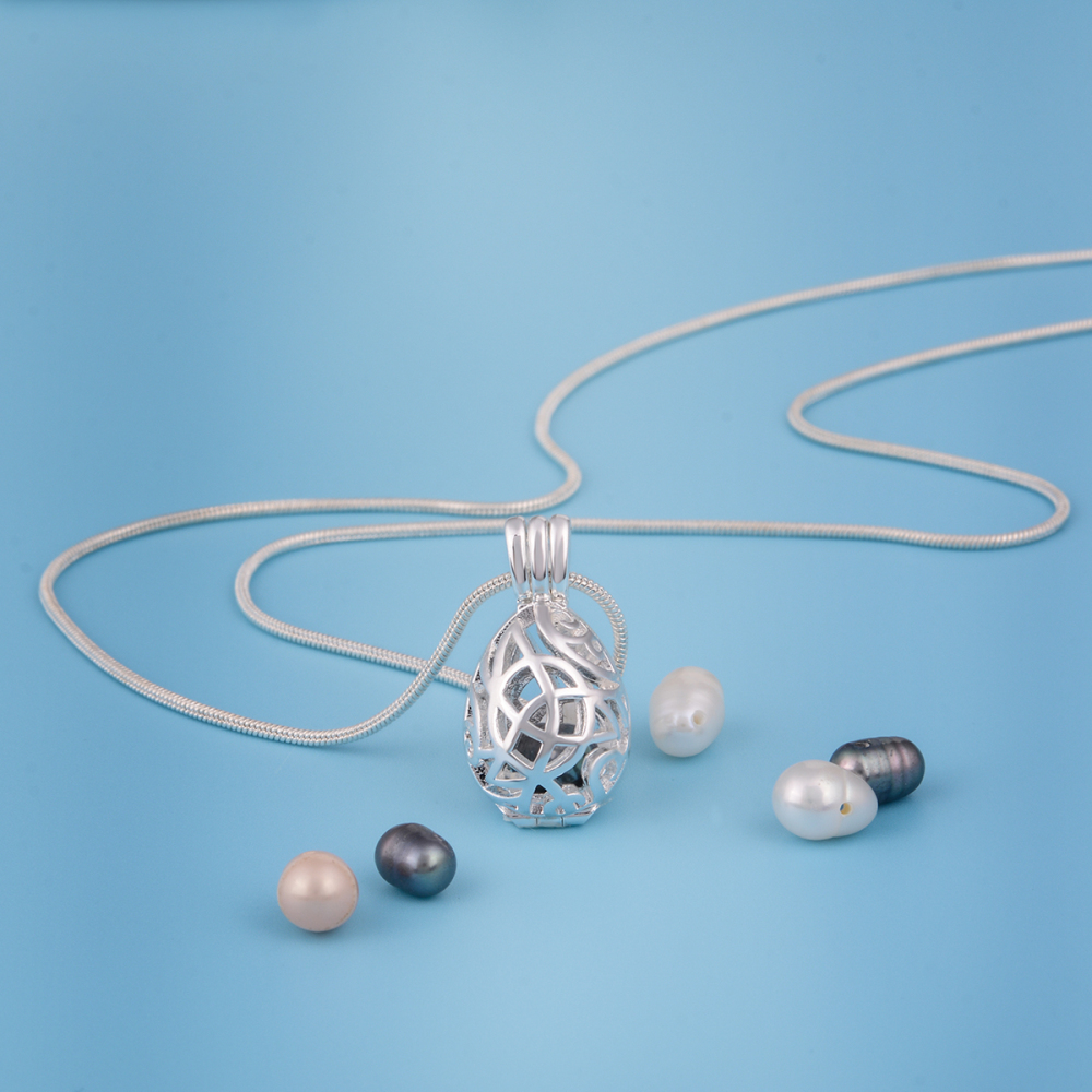 Silver-plated Celtic Knot Teardrop Pearls Cage Pendant