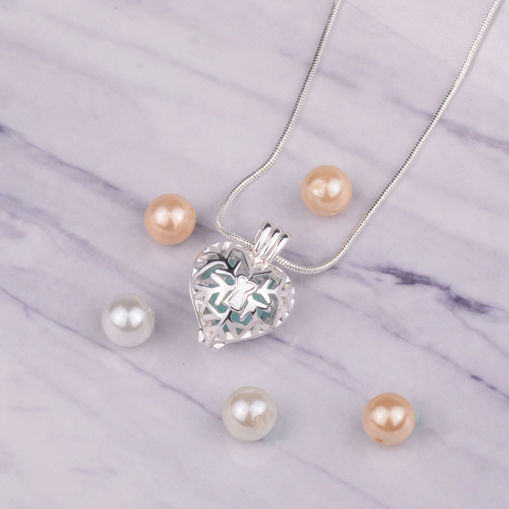 Christmas Snowflake Heart Pattern Pearls Cage Pendant
