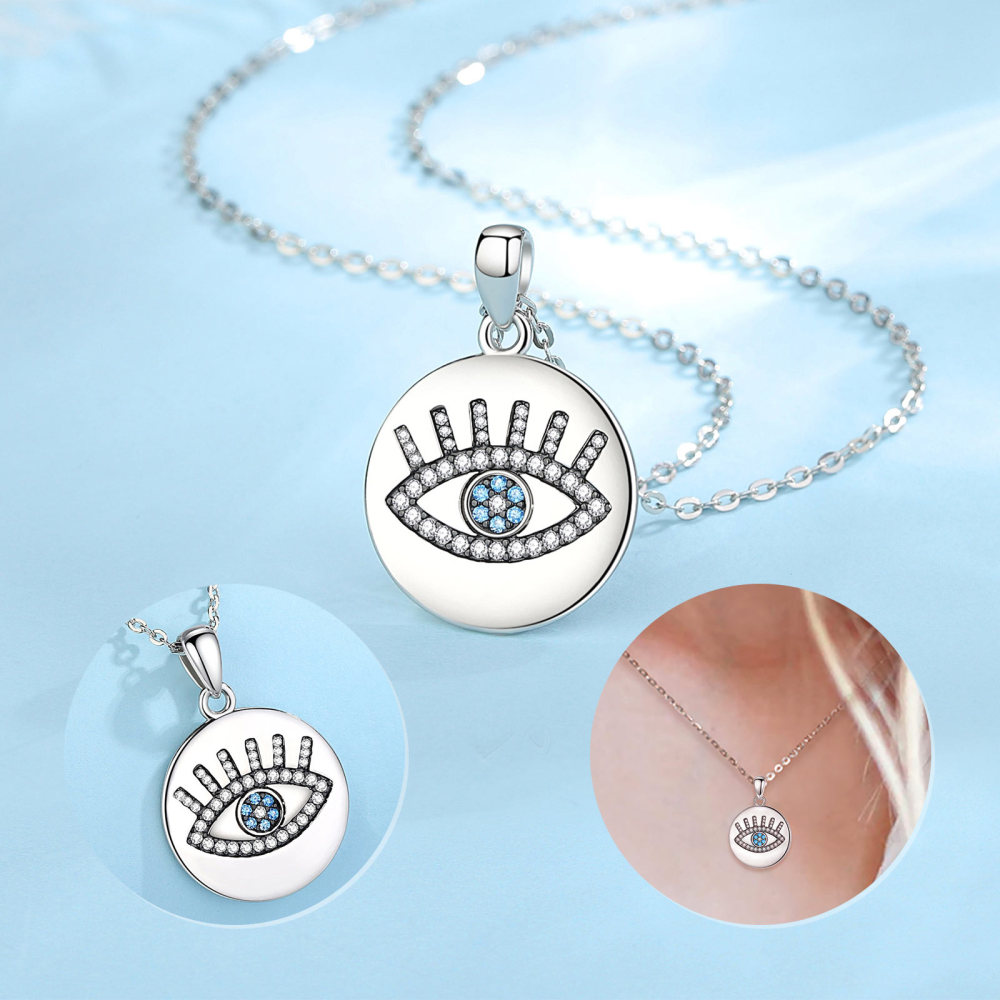 Round Sterling Silver Pendant with Evil Eye and Sky Blue Zircon