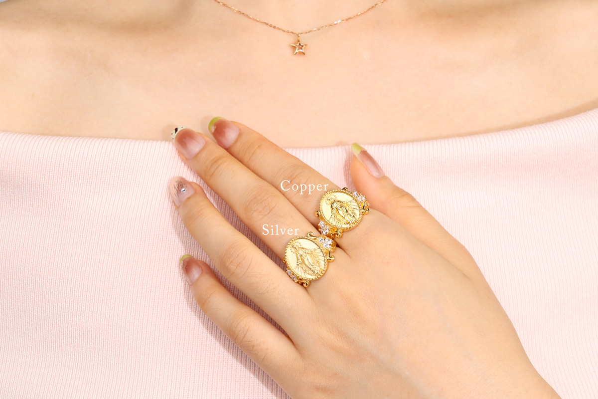 Model wearing silver vs copper 18K gold plated rings