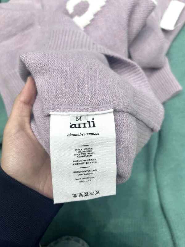 AMI Paris New autumn and winter polo collar knitted sweater with large peach heart buttons, loose casual unisex sweater, versatile top