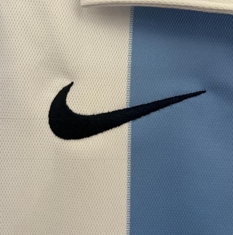 retro 12 13 malaga home jersey
