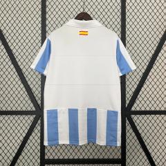 retro 12 13 malaga home jersey
