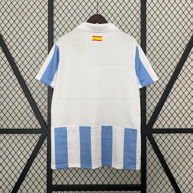 retro 12 13 malaga home jersey