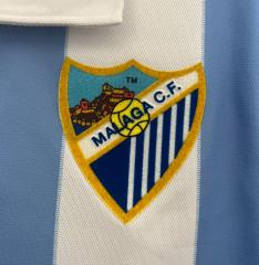retro 12 13 malaga home jersey