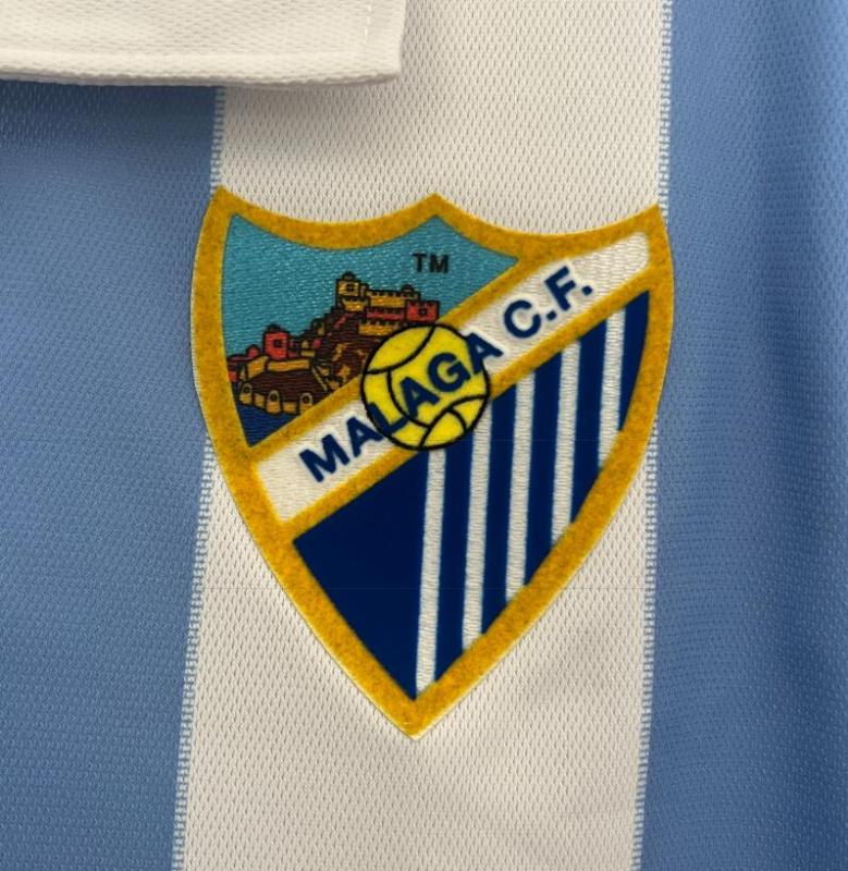 retro 12 13 malaga home jersey