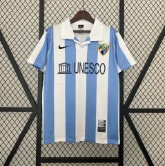 retro 12 13 malaga home jersey