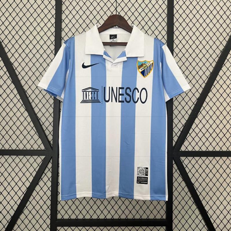 retro 12 13 malaga home jersey