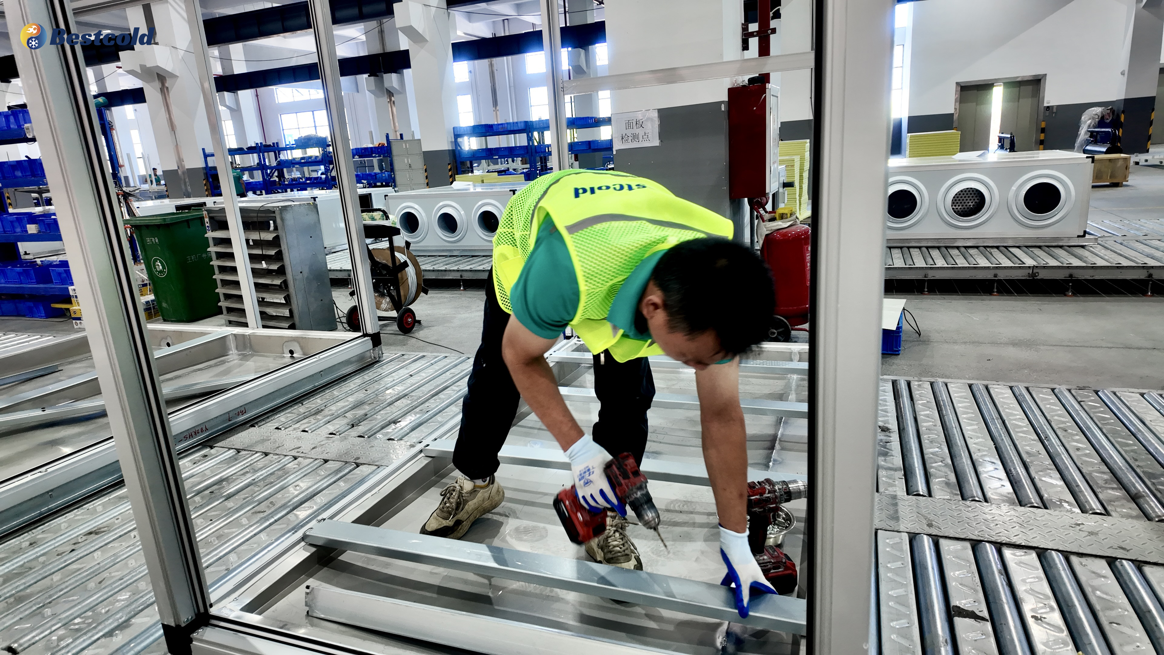 Bestcold HVAC technician assembling aluminum structural frame for commercial air handling units (AHU) in factory workshop