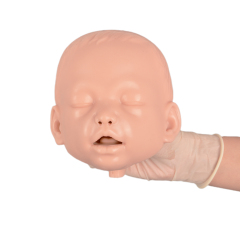 infant airway management skills trainer with realistic facial features
