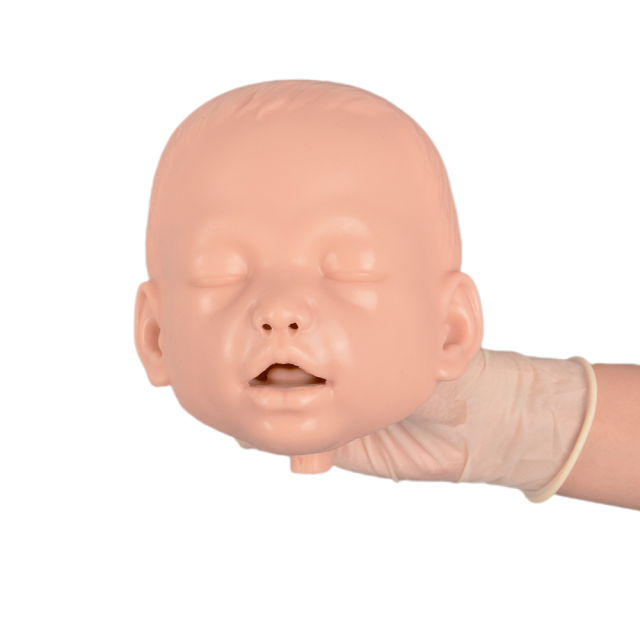 infant airway management skills trainer with realistic facial features