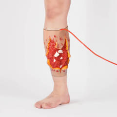 Wearable blast wound packing trainer (leg sleeve)