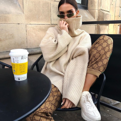 欧美外贸跨境秋冬时尚女装高领宽松套头针织衫纯色休闲百搭毛衣女