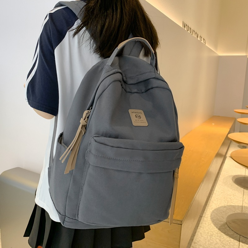 背包韩版学院风大容量双肩包女新款休闲初高中学生书包简约双肩包