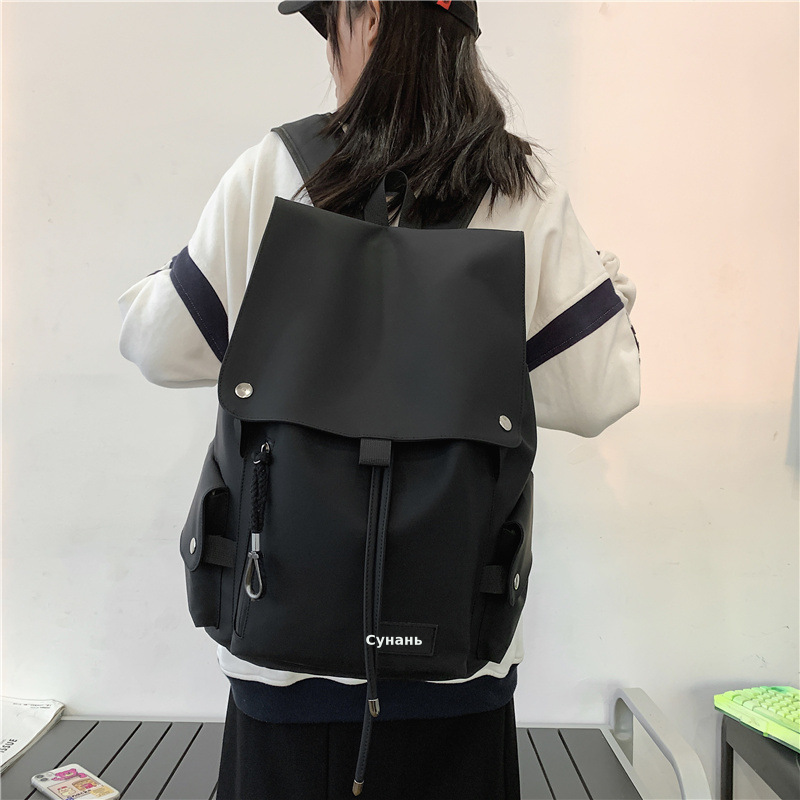 潮酷男女款双肩背包批发防泼水机车大容量大盖学生书包新款双肩包