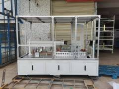 Automatic film wrapping machine