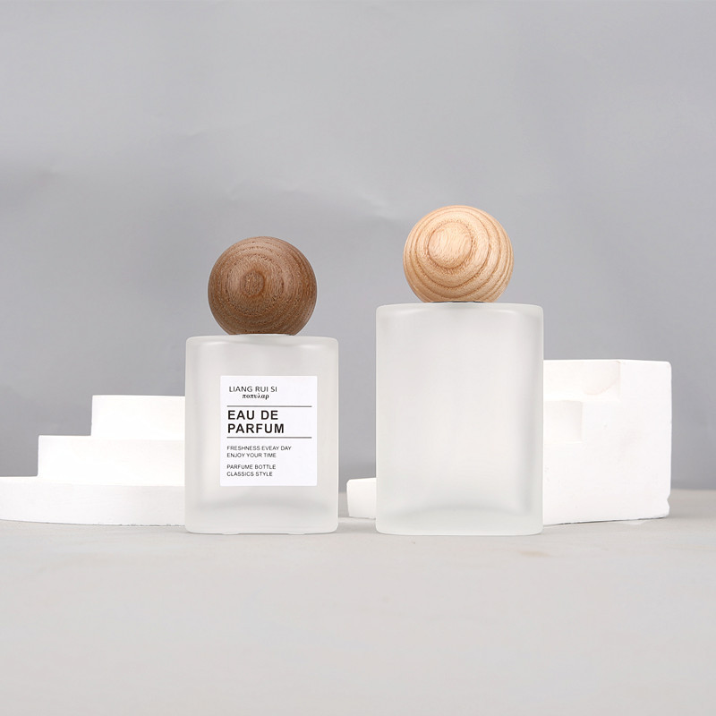 30ml 50ml frosted oval glass bottle with mist sprayer and  wooden ball cap
