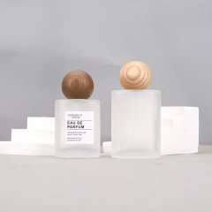 30ml 50ml frosted oval glass bottle with mist sprayer and  wooden ball cap