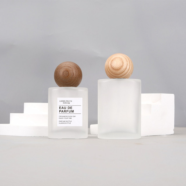 30ml 50ml frosted oval glass bottle with mist sprayer and  wooden ball cap