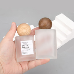 30ml 50ml frosted oval glass bottle with mist sprayer and  wooden ball cap