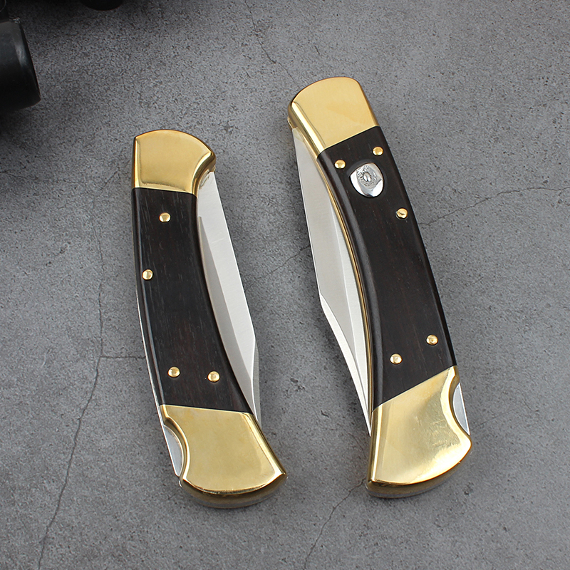 Buck 110/112 AUTO Folding Hunter 3.74" D2 Plain Blade, Ebony Wood Handles, Leather Sheath