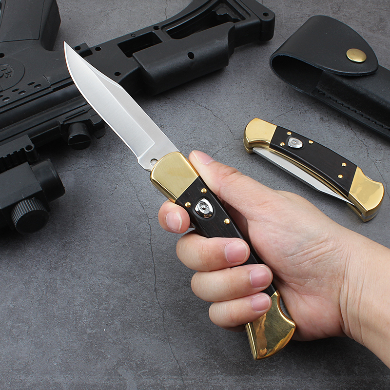 Buck 110/112 AUTO Folding Hunter 3.74" D2 Plain Blade, Ebony Wood Handles, Leather Sheath