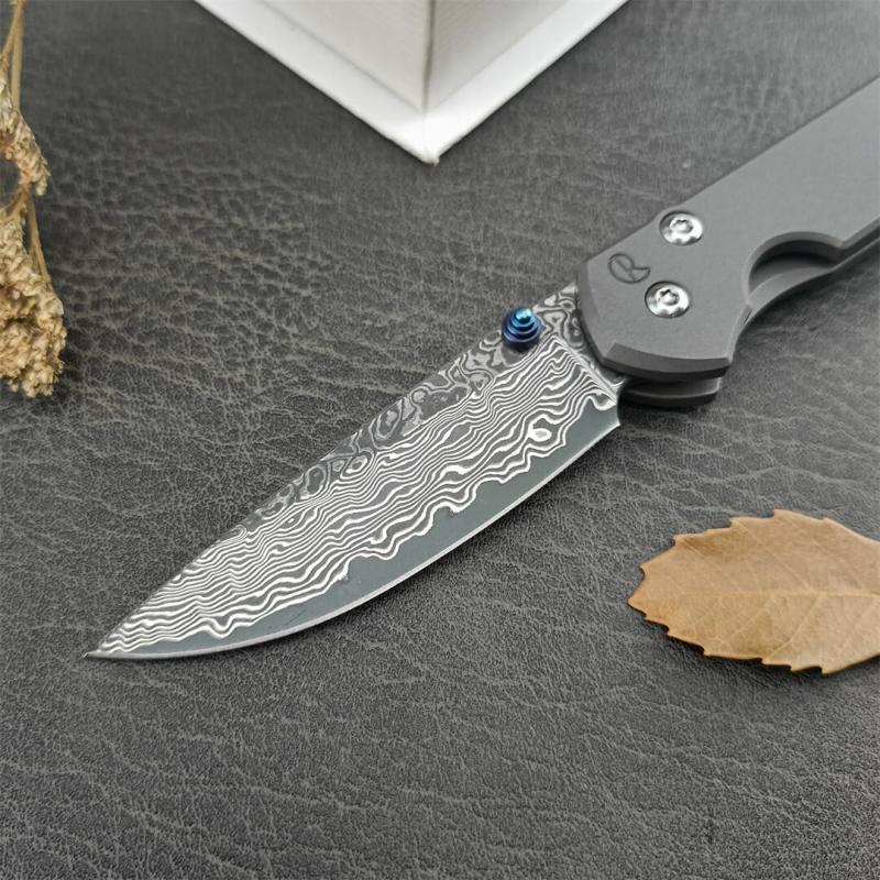 Chris Reeve Small Sebenza Folding Knife 2.76"  Damascus Blade, Titanium Handles, Frame Lock