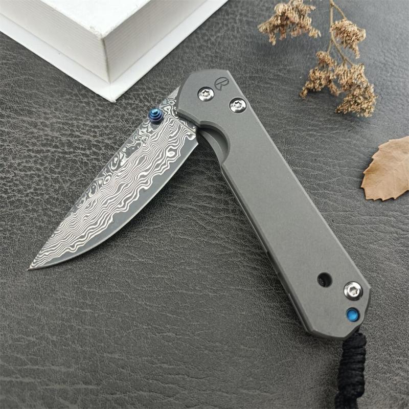 Chris Reeve Small Sebenza Folding Knife 2.76"  Damascus Blade, Titanium Handles, Frame Lock