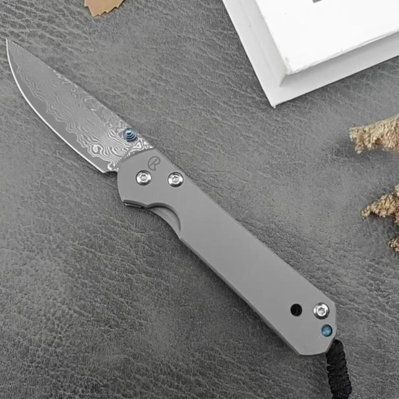 Chris Reeve Small Sebenza Folding Knife 2.76"  Damascus Blade, Titanium Handles, Frame Lock