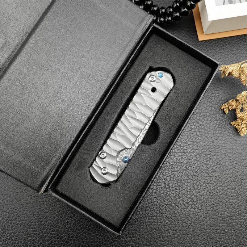 Chris Reeve Small Sebenza Folding Knife 2.76" Damascus Blade, Titanium Handles, Frame Lock
