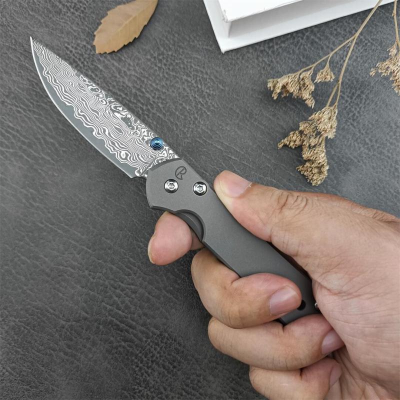 Chris Reeve Small Sebenza Folding Knife 2.76"  Damascus Blade, Titanium Handles, Frame Lock