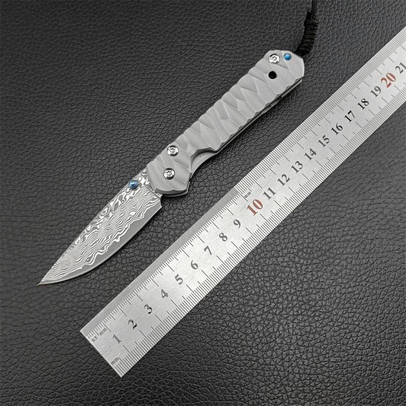 Chris Reeve Small Sebenza Folding Knife 2.76" Damascus Blade, Titanium Handles, Frame Lock