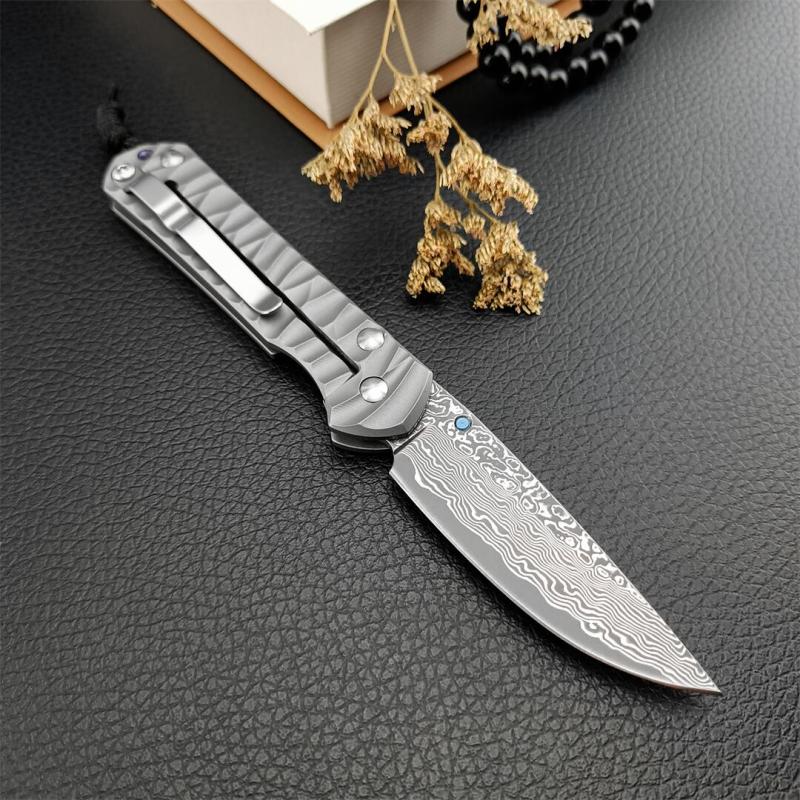 Chris Reeve Small Sebenza Folding Knife 2.76" Damascus Blade, Titanium Handles, Frame Lock