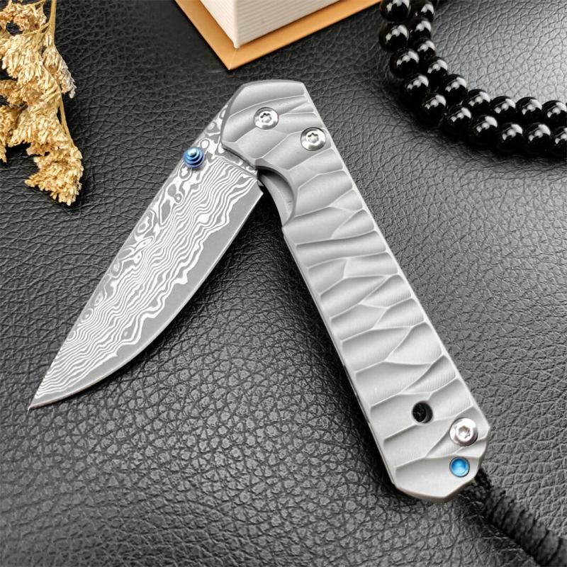 Chris Reeve Small Sebenza Folding Knife 2.76" Damascus Blade, Titanium Handles, Frame Lock