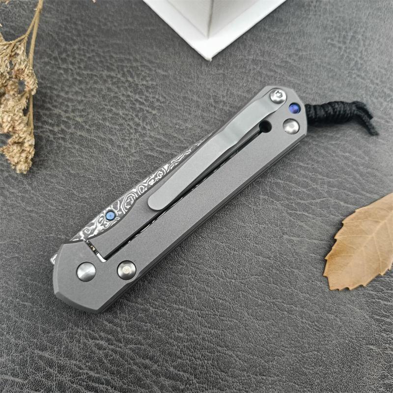 Chris Reeve Small Sebenza Folding Knife 2.76"  Damascus Blade, Titanium Handles, Frame Lock