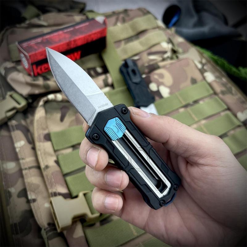 Kershaw 1190 Knives Sliding Button Lock Manual OTF Knife 1.9"  8Cr13MoV Stonewashed Spear Point Blade, Black GFN Handles