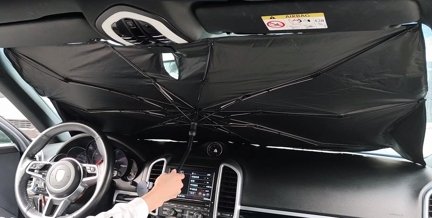 Car umbrella protecting a vehicle from the sun