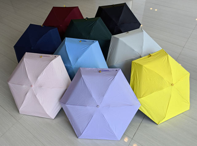 Factory Direct Supply Capsule UV Mini Umbrella Pocket with Logo for Customization